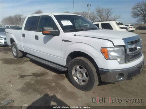 Report 1FTFW1EF3DKF06461 FORD F-150 2013 White Flexible Fuel - price and damage history