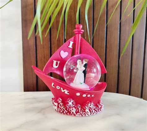 CraftVatika Resin Romantic Love Couple on Ship with Lighting Showpiece ...