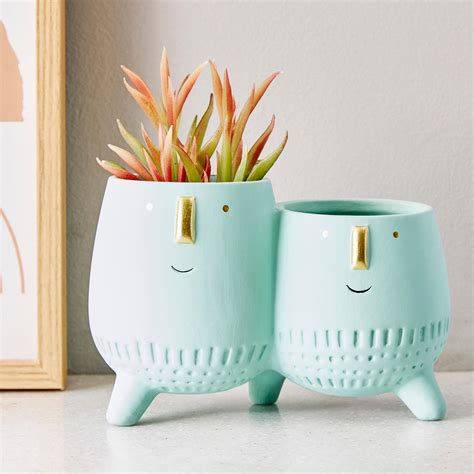 Buy Hello Spring Ceramic Face Planter from Home Centre at just INR 399.0