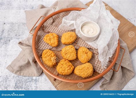 Air Fried Breaded Chicken Nuggets in a Basket with Dip and Ready To ...