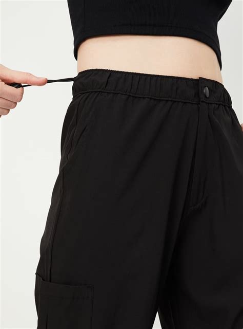 Buy Women Solid Relaxed Fit Parachute Pants Online at just Rs. 899.0 ...