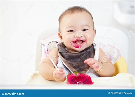 Baby eating dragon fruit stock photo. Image of fruit - 30323758