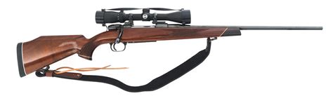 At Auction: MAUSER MODEL 3000 .30-06 CALIBER BOLT ACTION RIFLE