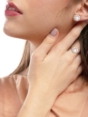 Buy Zaveri Pearls RoseGold Cubic Zirconia Brass Stud Earrings & Finger ...