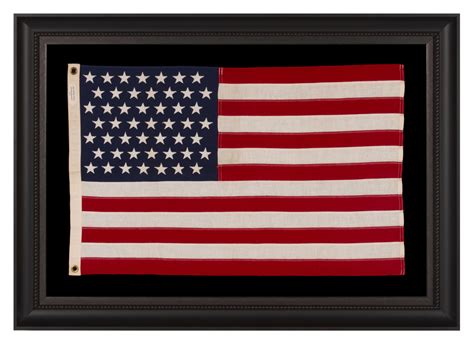 49 STAR AMERICAN FLAG IN A SMALL SCALE AMONG ITS COUNTERPARTS WITH ...