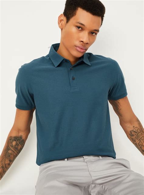 Buy Men Slim Fit Textured Polo T-shirt Online at just Rs. 699.0 ...