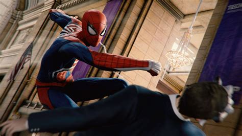 Download 4k Spiderman Slapping A Man Wallpaper | Wallpapers.com