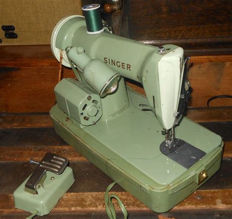 Image result for How to Operate a Singer Sewing Machine Rfj 12 8