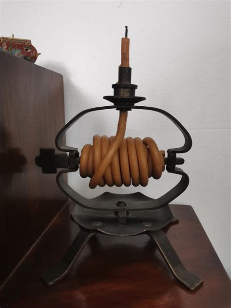 A funny candle I own, "Queue de rat" in French : r/Antiques