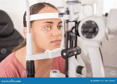 Vision, Ophthalmology and Woman in Eye Exam with Light on Iris at Eye Doctors Office. Healthcare ...