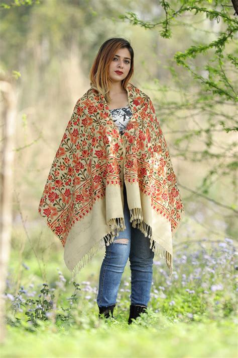 Beautiful beige colour stole with graceful dense jaal pattern