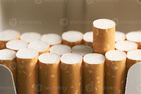 peel it off Cigarette pack prepare smoking on white wooden background ...