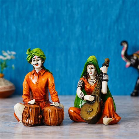 Colorful Combo of Rajasthani Craftsmen and Lady Playing a Musical Inst ...
