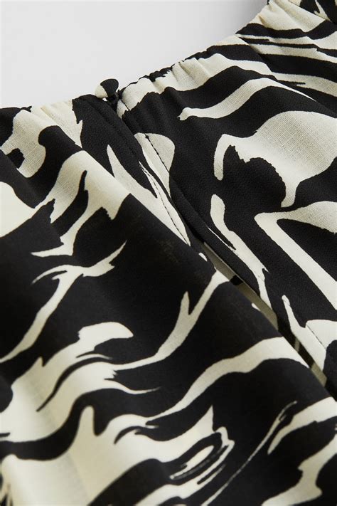 Patterned balloon-sleeved blouse - Black/Zebra-print - Ladies | H&M IN