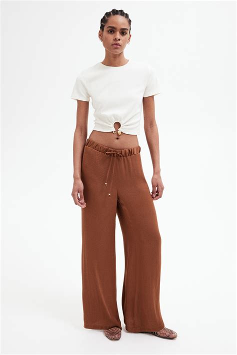 Wide drawstring trousers - Brown - Ladies | H&M IN