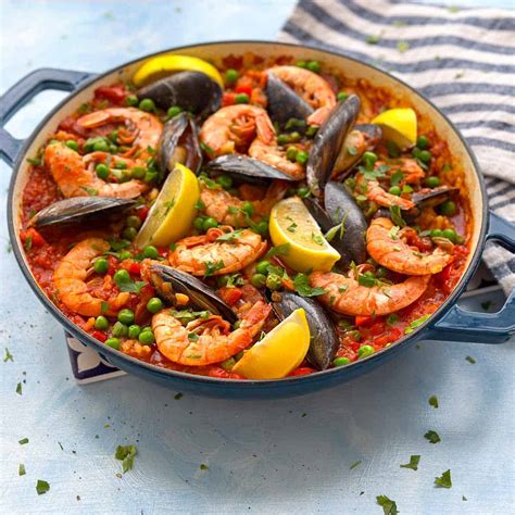 The Best Spanish Paella Recipe with Seafood and Chicken - Seasons in the Kitchen