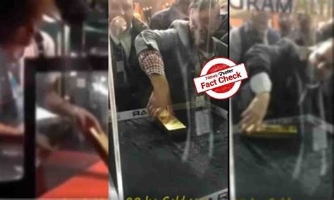 FactCheck : దుబాయ్ ఎయిర్ పోర్టులో ఒంటి చేత్తో 20 కేజీల బంగారు బిస్కెట్ ...