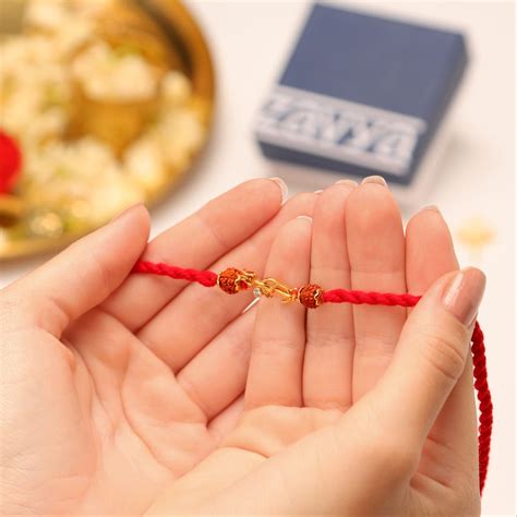 Om Trishul Charm Gold-Plated 925 Sterling Silver Rakhi with Rudraksha ...