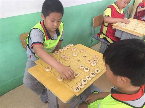 区象棋比赛在烟台外国语实验学校小学部举办_烟台教育_胶东在线教育频道