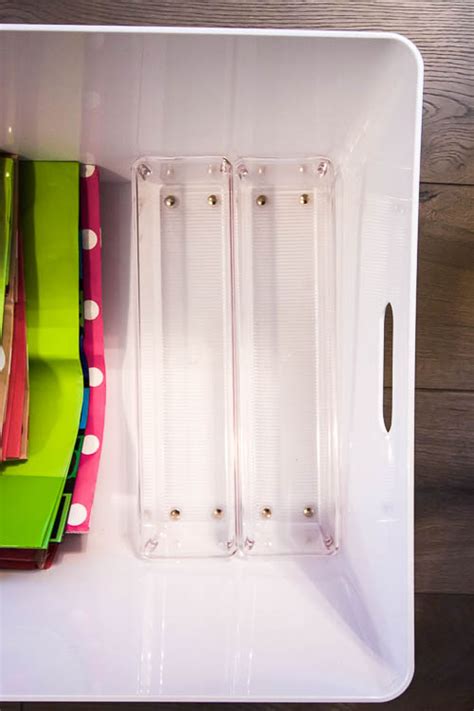 An Organized Wrapping Paper Storage Bin - Small Stuff Counts