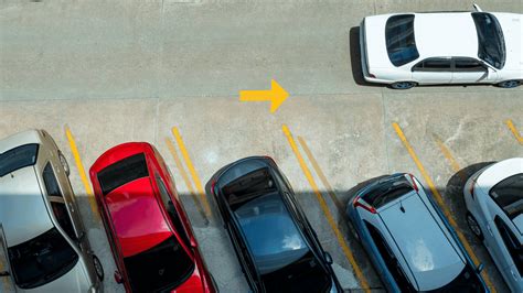 Download White Car Passing By Cars In Parking Lot Wallpaper ...