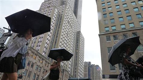 Heavy rain triggers flash floods and travel chaos on US East Coast