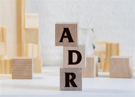 Letter block in word adr abbreviation of adverse drug reaction on wood ...