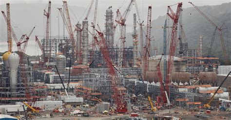 In a world deluged by plastics, a giant factory rises to manufacture ...