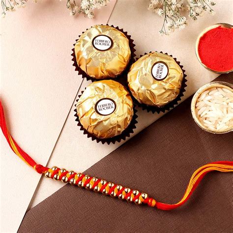 Send Sneh Gold Mauli Rakhi and 3 Ferrero Rocher Online | Rakhibazaar.com