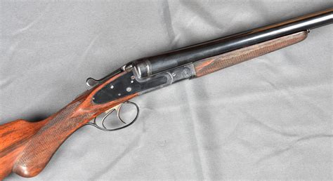 Lot - A Fabrique Nationale double barrel side by side 12 bore shotgun ...
