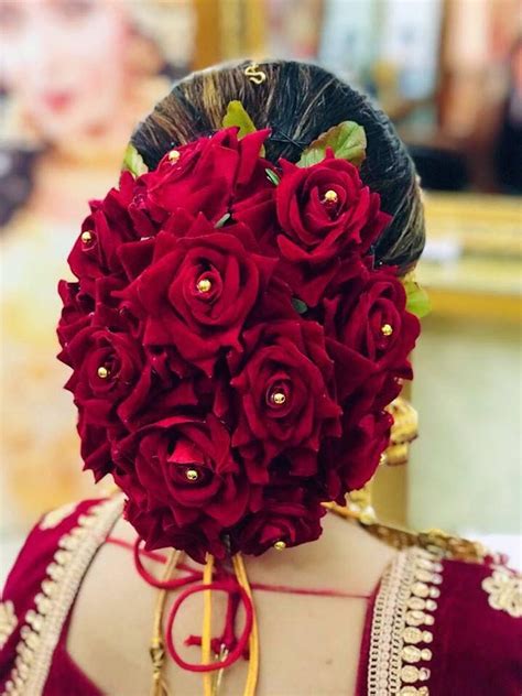 Trending Bridal Bun Hairstyle With Flowers For Wedding