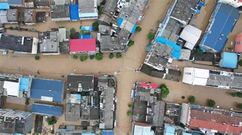 Thousands evacuated in China after heaviest rains in decades