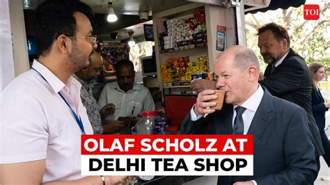 scholz: Delhi: German chancellor Olaf Scholz takes a sip of tea during ...
