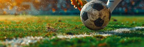 Person Kicking Soccer Ball on Field 46108901 Stock Photo at Vecteezy