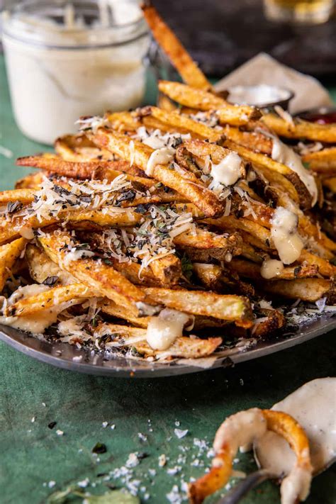 Garlic Parmesan French Fries Dressed in Caesar Dressing. - Half Baked ...