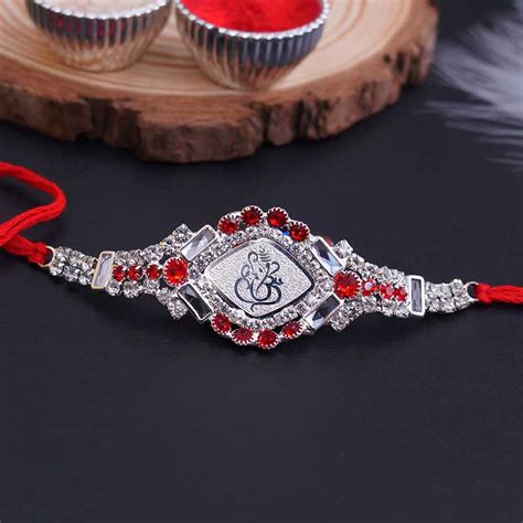 Send Alluring Silver Ganesha Rakhi Online | Rakhibazaar.com