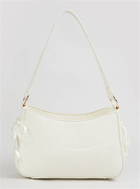 Buy Women Textured Shoulder Bag Online at just Rs. 999.0 ...