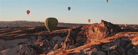 Download wallpaper 2560x1024 air balloons, mountains, flight, turkey ...