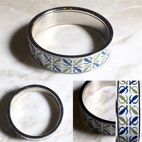 LOEWE wide metal bangle “anagram” | NOIR ONLINE