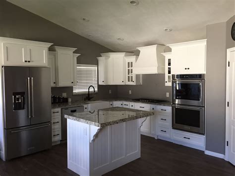Grey Walls with White Kitchen Cabinets