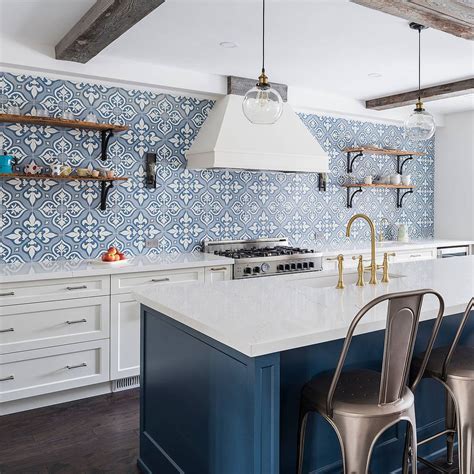 Blue Cement Backsplash Tile with White Quartz Kitchen Cabinets
