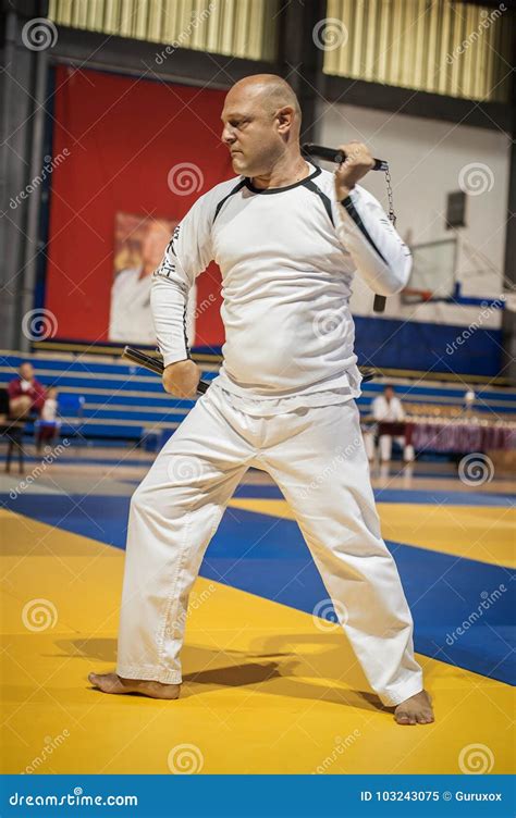 Martial Art Instructor Demonstrate and Practice Nunchaku Techniques Training Editorial Image ...
