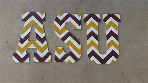 Wood letters purchased from Hobby Lobby. I also bought a stencil to do ...