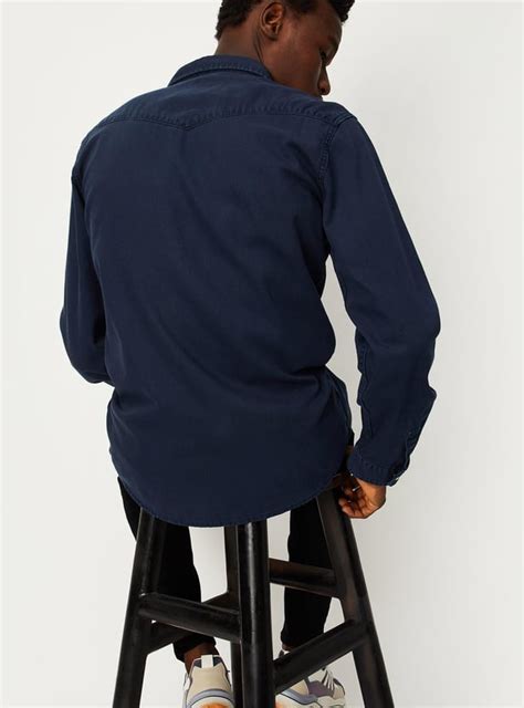 Buy Men Solid Slim Fit Denim Shirt Online at just Rs. 1199.0 ...
