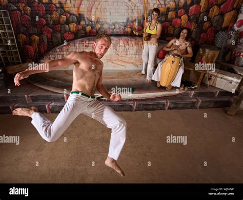 Capoeira group performing martial arts and music Stock Photo - Alamy