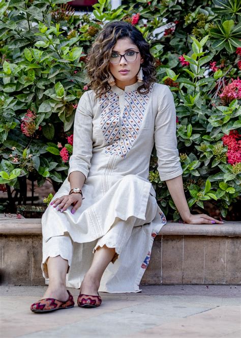 Off-white hand embroidered straight cut handloom cotton kurta with seq ...