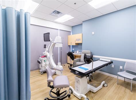 An exam room and medical scanning space at Carolina Fertility Institute.