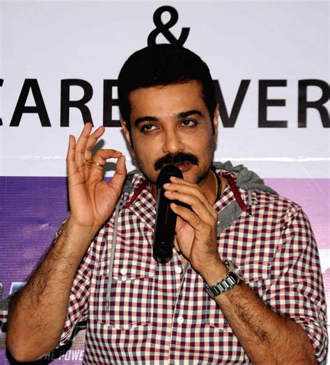 Prosenjit Chatterjee with autistic children during a workshop