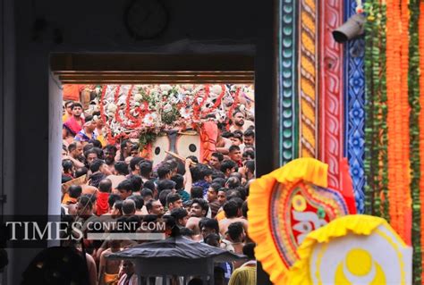 Ratha Yatra Feature Photo Devotees participate in the t...