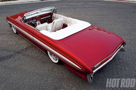 Download Lowrider Oldsmobile Starfire Convertible Wallpaper | Wallpapers.com